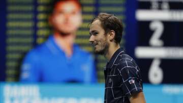 Daniil Medvedev of Russia smiles after winning against Rafael Nadal of Spain in their semifinal match at the ATP World Finals tennis tournament at the O2 arena in London, Saturday, Nov. 21