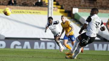 Fulham's Ivan Cavaleiro misses a penalty shot during the English Premier League soccer match between Fulham and Everton, at Craven Cottage stadium, London, Sunday, Nov. 22