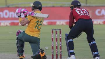 South African batsman Faf Du Plessis miss hits the ball while England wicketkeeper Jos Butler looks on during the third T20 cricket match between South Africa and England in Cape Town, South Africa, Sunday, Nov. 29