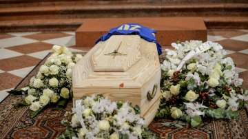 His jersey with number 20 of the winning World Cup team is placed on the coffin of Paolo Rossi during his funeral service, in Vicenza, Italy, Saturday, Dec. 12