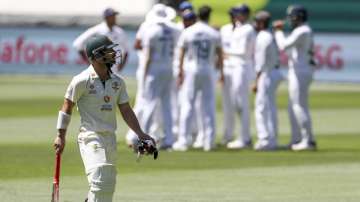 Australia's Matthew Wade walks from the field after he was dismissed for 30 runs during play on day one of the Boxing Day cricket test between India and Australia at the Melbourne Cricket Ground, Melbourne, Australia, Saturday, Dec. 26