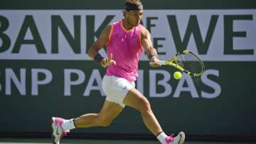 Rafael Nadal, of Spain, hits a forehand to Karen Khachanov, of Russia, at the BNP Paribas Open tennis tournament in Indian Wells, Calif., in this Friday, March 15, 2019