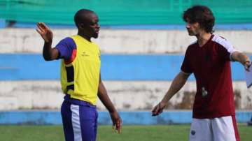 NEUFC head coach Gerard Nus (right)