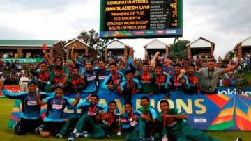 Bangladesh's Under-19 cricket team with the World Cup trophy 