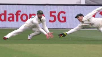 Tim Paine takes a screamer to dismiss Cheteshwar Pujara