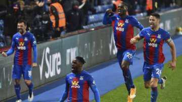 Crystal Palace's Jeffrey Schlupp, (15), celebrates after scoring his sides 1st goal of the game during their English Premier League soccer match between Crystal Palace and Tottenham Hotspur at Selhurst Park in London, Sunday, Dec., 13