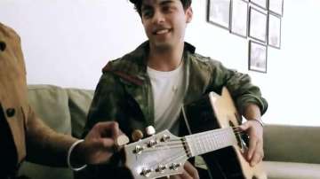 Shah Rukh Khan's son Aryan Khan plays guitar and sings 'Attention' by Charlie Puth