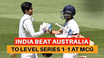 India's Ajinkya Rahane, right, and teammate Shubman Gill shake hands as they celebrate after winning the second cricket test between India and Australia at the Melbourne Cricket Ground, Melbourne, Australia, Tuesday, Dec. 29