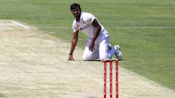 India's Thangarasu Natarajan falls onto the pitch during play on day two of the fourth cricket test between India and Australia at the Gabba, Brisbane, Australia, Saturday, Jan. 16