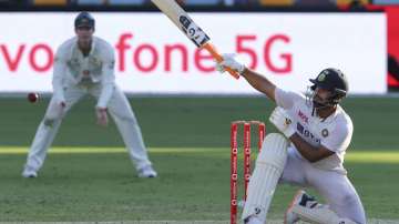 India's Rishabh Pant hits the ball to the boundary on the final day of the fourth cricket test against Australia at the Gabba, Brisbane, Australia, Tuesday, Jan. 19