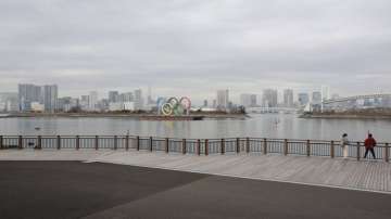 The Olympic rings are seen at the empty Odaiba waterfront in Tokyo, Tuesday, Jan. 26, 2021. The Tokyo Games, postponed in the midst of a pandemic, are scheduled to open on July 23