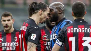 AC Milan's Zlatan Ibrahimovic, center left, and Inter Milan's Romelu Lukaku, center right, argue during an Italian Cup round of 8 soccer match between Inter Milan and AC Milan at the San Siro stadium, in Milan, Italy, Tuesday, Jan. 26