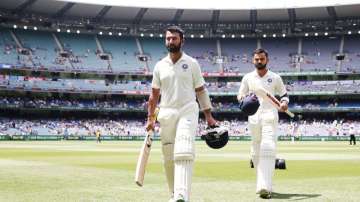 Cheteshwar Pujara and Virat Kohli