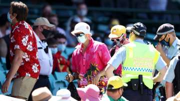 Police speak to spectators following a complaint from Mohammed Siraj of India that stopped play during day four of the Third Test match in the series between Australia and India at Sydney Cricket Ground on January 10, 2021 in Sydney, Australia.