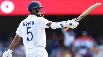 Washington Sundar of India celebrates his half century during day three of the 4th Test Match in the series between Australia and India at The Gabba on January 17