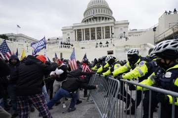 Chaos, violence, mockery as pro-Trump mob occupies Congress, 1 killed