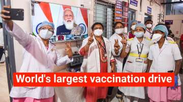 Doctors and health workers take a selfie, after the virtual launch of COVID-19 vaccination drive by Prime Minister Narendra Modi.