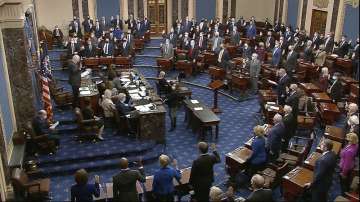 In this Jan. 26, 2021, image from video, Sen. Patrick Leahy, D-Vt., the president pro tempore of the Senate, who is presiding over the impeachment trial of former President Donald Trump, swears in members of the Senate for the impeachment trial at the U.S. Capitol in Washington. 
 