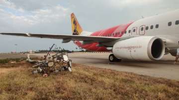 Air India Express flight hits an electric pole while landing at vijayawada airport, passengers safe