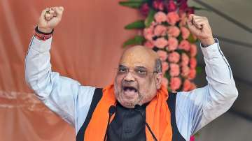 Union Home Minister Amit Shah addresses a public meeting to launch the Paribartan Yatra at Indira maidan in South 24 Pargana district of West Bengal.
