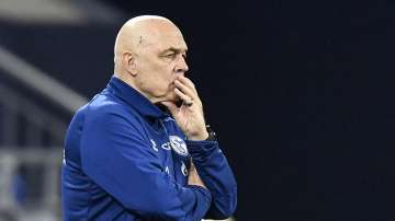 Schalke's head coach Christian Gross watching during the German Bundesliga soccer match between FC Schalke 04 and Borussia Dortmund in Gelsenkirchen