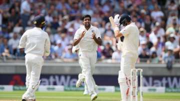 England batsman Joe Root reacts as India bowler Ravi Ashwin celebrates his wicket during day 3 of the First Specsavers Test Match at Edgbaston on August 3, 2018 in Birmingham, England