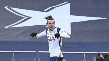 Tottenham's Gareth Bale celebrates after scoring his side's fourth goal during an English Premier League soccer match between Tottenham Hotspur and Burnley at the Tottenham Hotspur Stadium in London, England, Sunday, Feb. 28