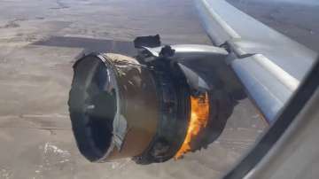 The engine of United Airlines Flight 328 is on fire after after experiencing "a right-engine failure