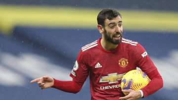 Manchester United's Bruno Fernandes gestures during the English Premier League soccer match between West Bromwich Albion and Manchester United at the Hawthorns stadium in West Bromwich, England, Sunday, Feb. 14