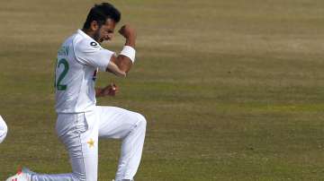 Pakistan's Hasan Ali celebrates after taking the wicket of South Africa's George Linde during the fifth day of the second cricket test match between Pakistan and South Africa at the Pindi Stadium in Rawalpindi, Pakistan, Monday, Feb. 8