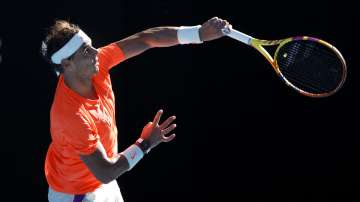 Spain's Rafael Nadal serves to Serbia's Laslo Djere during their first round match at the Australian Open tennis championship in Melbourne, Australia, Tuesday, Feb. 9