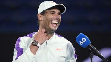 Spain's Rafael Nadal laughs during an interview following his win over Britain's Cameron Norrie in their third round match a the Australian Open tennis championships in Melbourne, Australia, Saturday, Feb. 13