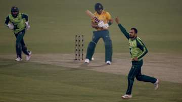 Pakistan's Mohammad Nawaz, right, celebrates after taking the wicket of South Africa's Reeza Hendricks, center, during the 3rd Twenty20 cricket match between Pakistan and South Africa at the Gaddafi Stadium, in Lahore, Pakistan, Sunday, Feb. 14