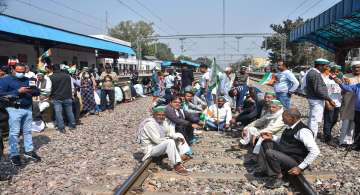 Members of various farmer organisations block a railway track in Ghaziabad during a four-hour rail roko demonstration across the country, called by Samyukta Kisan Morcha (SKM).
 
