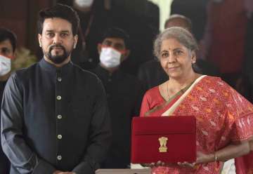 Finance Minister Nirmala Sitharaman holds a folder case containing the Union Budget 2021-22, during 