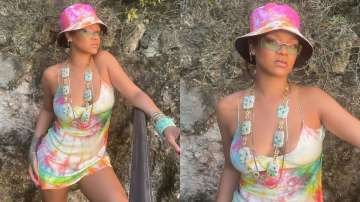 Netizens slam pop sensation Rihanna after she shares topless photo wearing Ganesha pendant