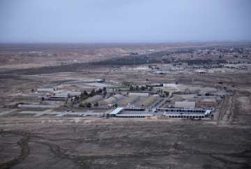 FILE - This Dec. 29, 2019, aerial file photo taken from a helicopter shows Ain al-Asad air base in the western Anbar desert, Iraq. At least 10 rockets targeted a military base in western Iraq that hosts U.S.-led coalition troops on Wednesday, March 3, 2021, the coalition and the Iraqi military said. It was not immediately known if there were any casualties.
 