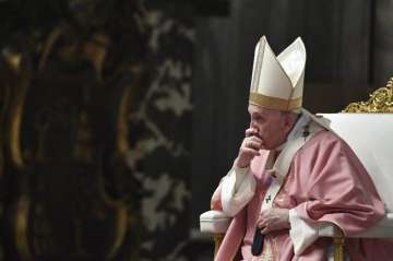 Pope Francis celebrates mass on the occasion of 500 years of Christianity in the Philippines, in St. Peter's Basilica, at the Vatican, Sunday, March 14, 2021. (Tiziana Fabi/Pool photo via AP)
?