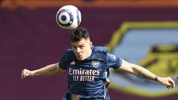 Arsenal's Granit Xhaka heads the ball during the English Premier League soccer match between Burnley and Arsenal at Turf Moor stadium in Burnley, England, Saturday, March 6