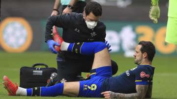 Southampton's Danny Ings is treated after getting injured during an English Premier League soccer match between Sheffield United and Southampton at the Bramall Lane stadium in Sheffield, England, Saturday March 6