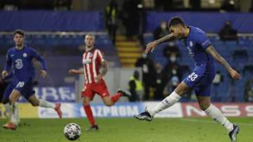 Chelsea's Emerson Palmieri, right, scores his side's second goal during the Champions League, round of 16, second leg soccer match between Chelsea and Atletico Madrid at the Stamford Bridge stadium, London, Wednesday, March 17