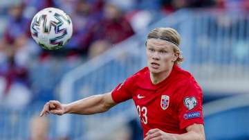 Norway's Erling Haaland controls the ball during a World Cup 2022 group G qualifying soccer match between Norway and Turkey at La Rosaleda stadium in Malaga, Spain, Saturday, March 27