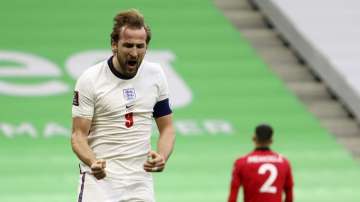 England's Harry Kane celebrates his side's first goal during the World Cup 2022 group I qualifying soccer match between Albania and England at Air Albania stadium in Tirana, Sunday, March 28