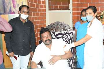 Karnataka minister BC Patil, Karnataka minister home vaccination controversy, health ministry report