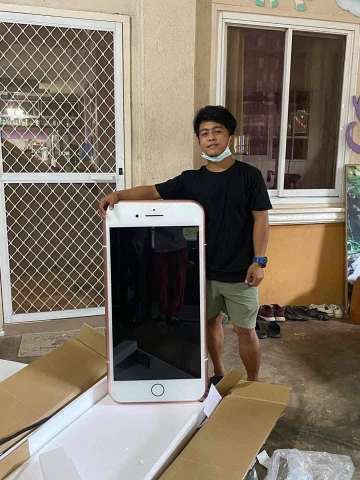 Boy orders iPhone, gets an iPhone-shaped table instead!