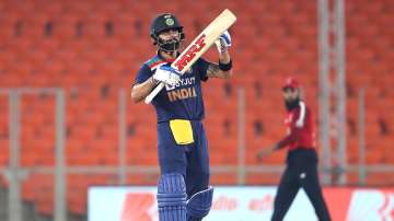 India Captain Virat Kohli celebrates after making 50 during the 5th T20 International between India and England at Narendra Modi Stadium on March 20