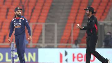 Virat Kohli of India in conversation with the umpire following the wicket of Jos buttler during the 5th T20 International between India and England at Narendra Modi Stadium on March 20