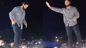 Bhediya: Varun Dhawan climbs car atop to address fans as they interrupt shoot; Watch