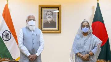 Prime Minister Narendra Modi with the Prime Minister of Bangladesh Sheikh Hasina at a meeting in Bangladesh.