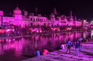 Devotees light earthen lamps at illuminated Ram Ki Paidi to celebrate the groundbreaking ceremony of the Ram Temple, in Ayodhya.?